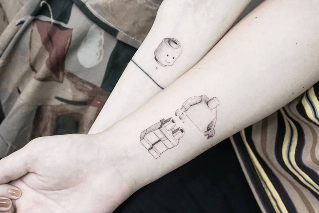 Matching-LEGO-tattoo-by-tattooist-Ian-Wong.jpg