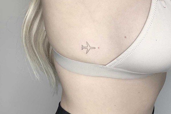 Tiny-airplane-tattoo-by-Conz-Thomas.jpeg
