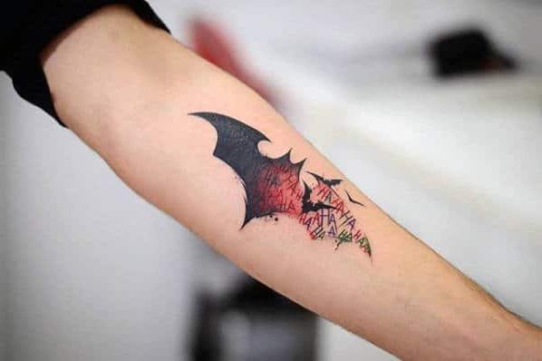 awesome-black-and-red-ink-male-forearm-tattoo-of-batman-symbol.jpg