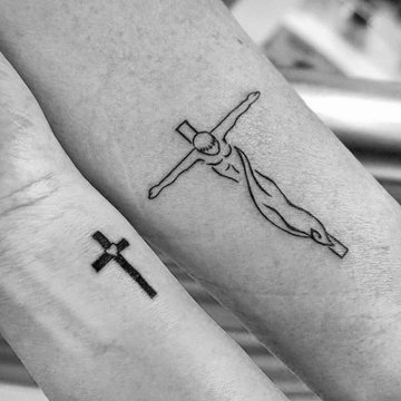 jesus-on-the-cross-mens-simple-black-ink-outline-inner-forearm-tattoo.jpg