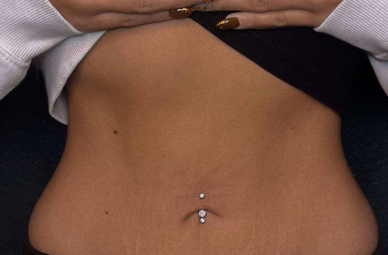 Пирсинг пупка